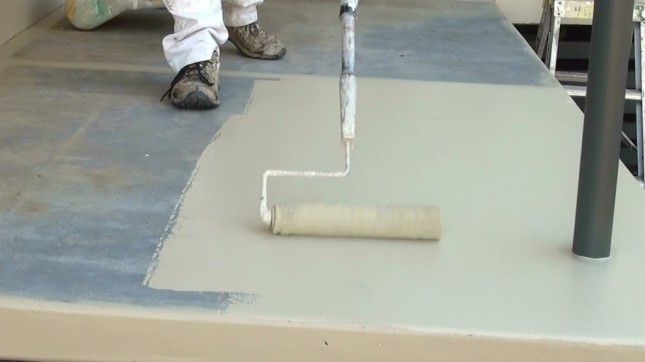 Applying Sealer to Concrete Floor